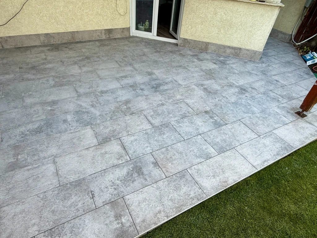Completed grey outdoor terrace tiles